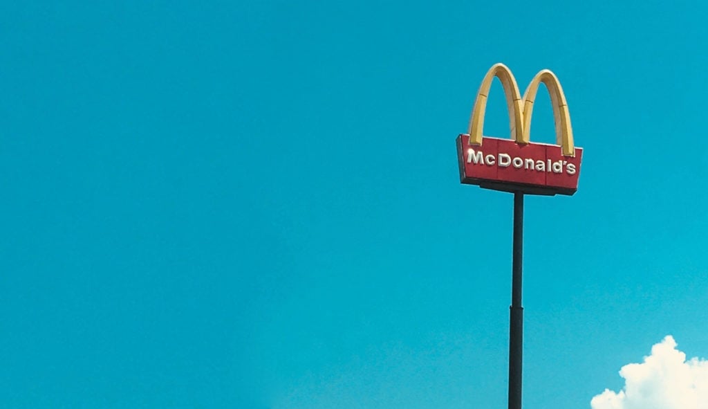 McDonald's sign on a stark sky background